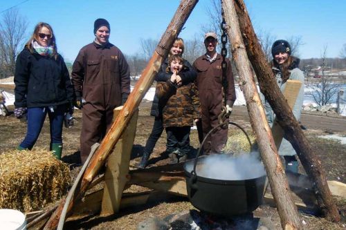 guests added sap to a boiling pot set up at George and Darlene Conboy and Sons farm located at 2559 Bell Line Road in Sharbot Lake, l-r, Jessica Scribner, Devon Conboy, Cecilia Stewart, Justin David Peterson, Trevor Conboy, and Jen Soukop